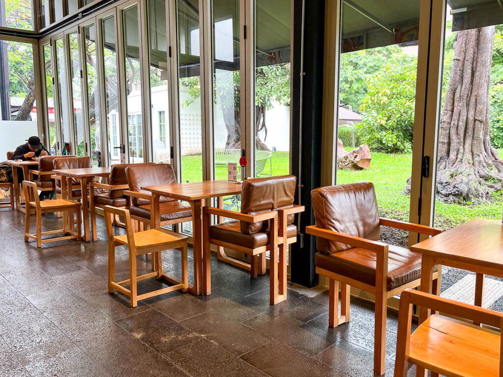 Wooden tables and chairs at Vaanaa Cafe & Bistro