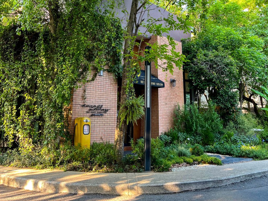 A warm welcome awaits—the terracotta brick entrance of Caramellow Cafe