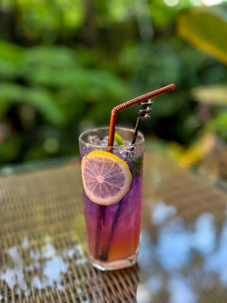 A swirl of purple and gold—Butterfly Pea Lemon Soda at Caramellow