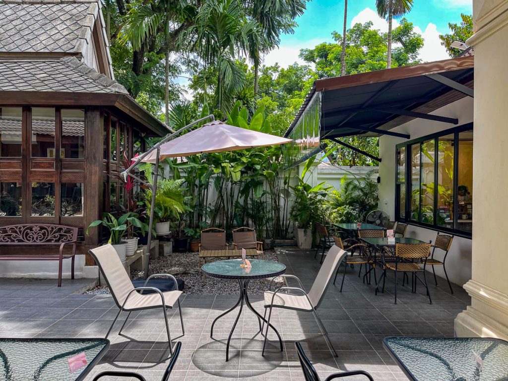 Goodneighbor Cafe’s outdoor space—a leafy retreat with laid-back charm