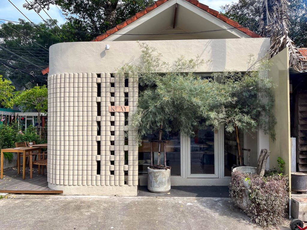 Where architecture meets atmosphere — the iconic exterior of KLAY, Chiang Mai, in earthy tones