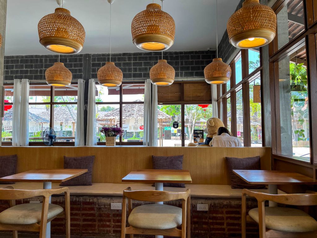 Earthy tones, generous sockets, and good coffee—a calm, functional space made for slow mornings and long afternoons