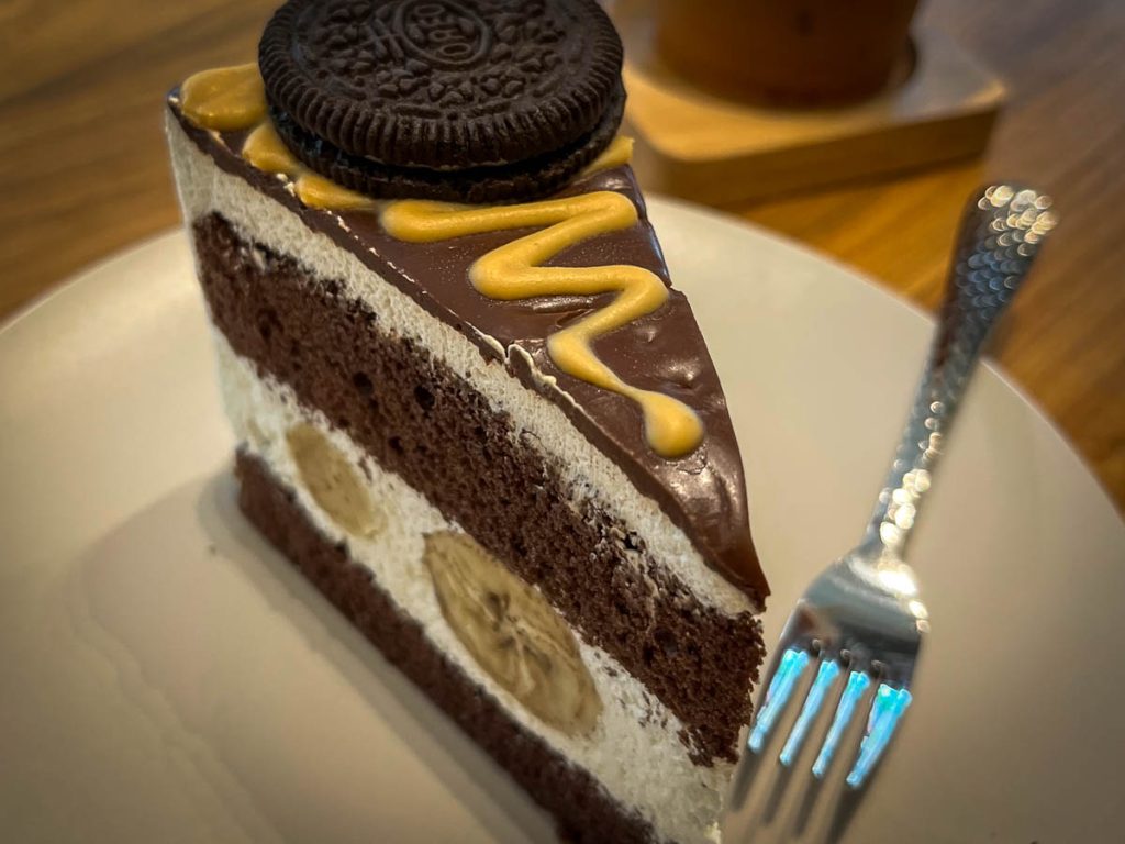 Beyond the brews—a tempting slice of chocolate-banana-Oreo cake at Roastniyom JJ-ECO