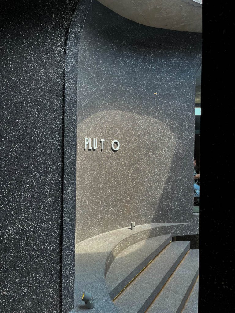 A study in form and shadow—PLUTO's striking and minimalist design makes it an architectural destination