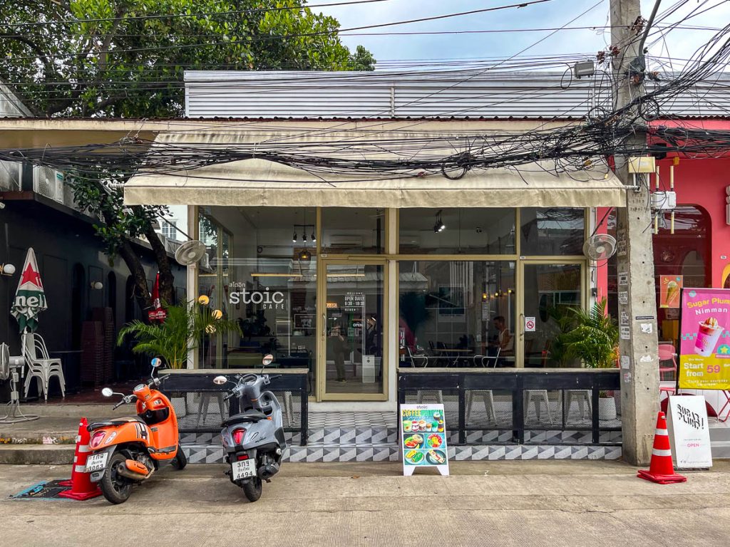 Stoic Cafe’s minimalist frontage on a lively Nimman soi