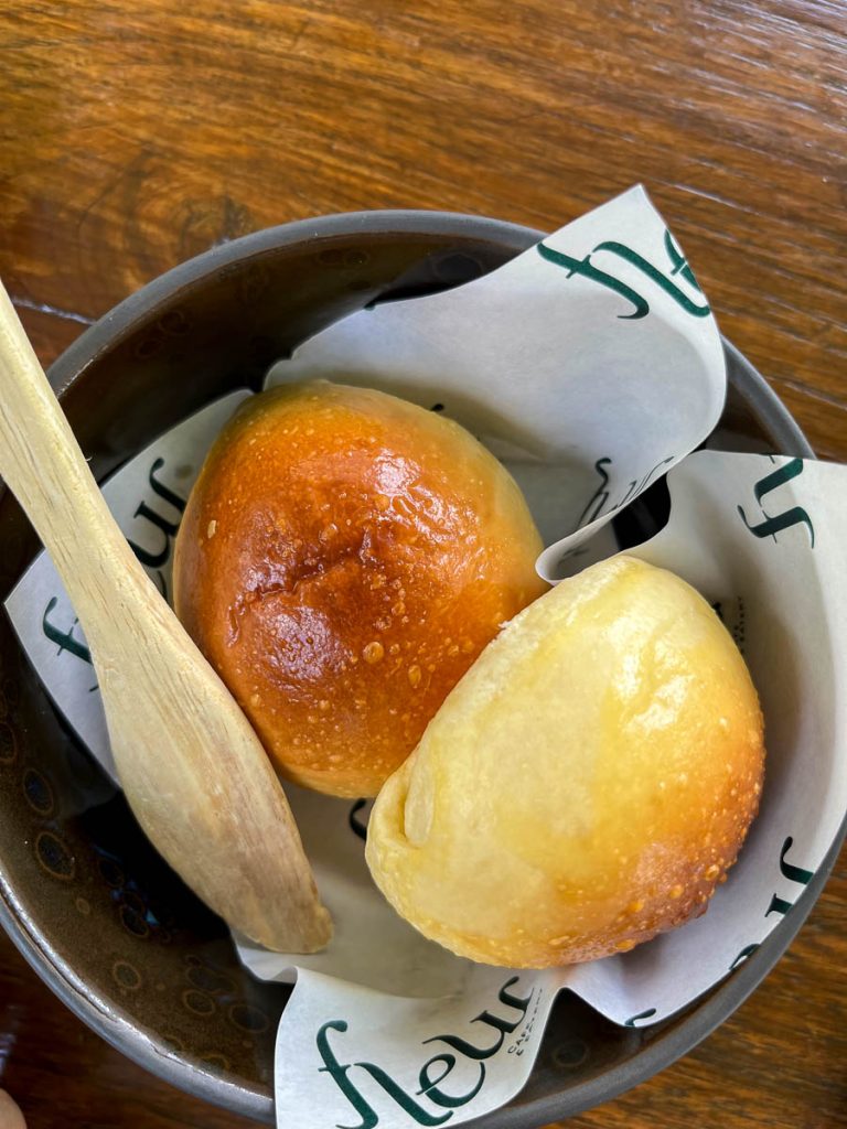It all begins with warm, house-baked bread—Fleur’s simple but comforting welcome to the table