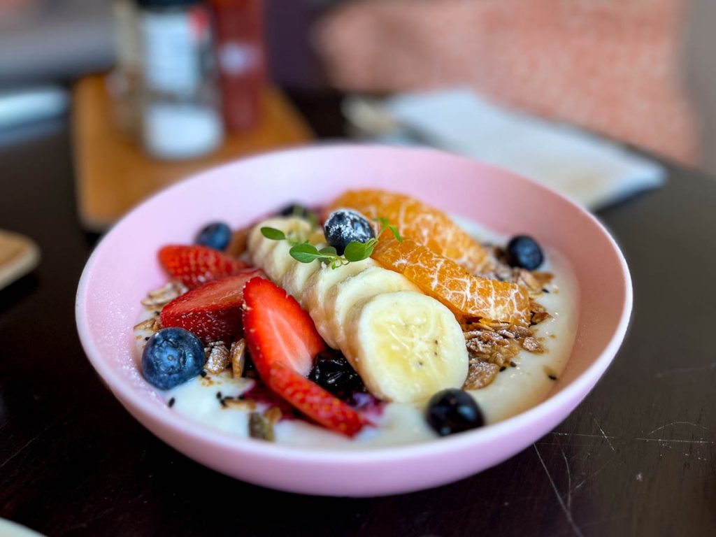 Fresh fruit and yoghurt granola bowl served at The Pantry in Baan 104
