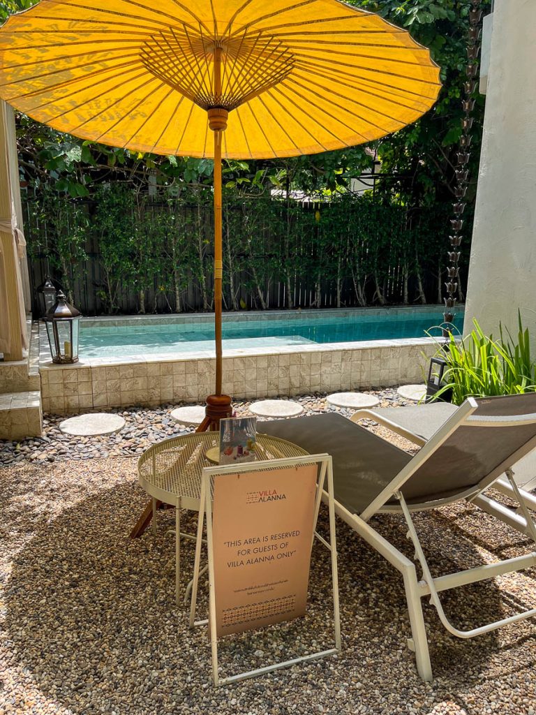 A peaceful poolside area reserved for guests of Villa Alanna