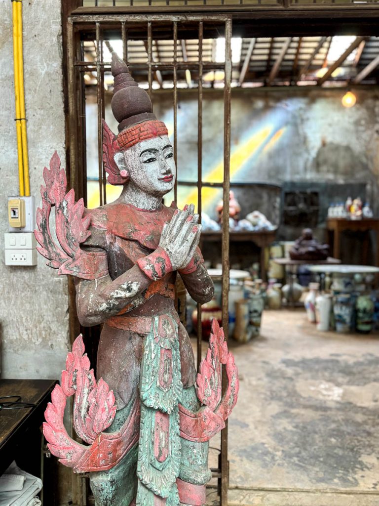 Traditional statue and workshop space at HAAN Studio, accessed through Flo Coffee Brewers in Chiang Mai