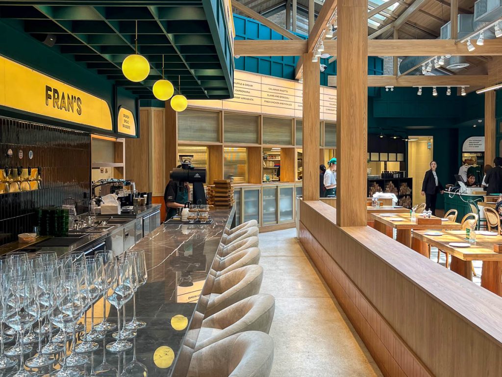Brew Bar at FRAN’S Chiang Mai with marble counter and green interior