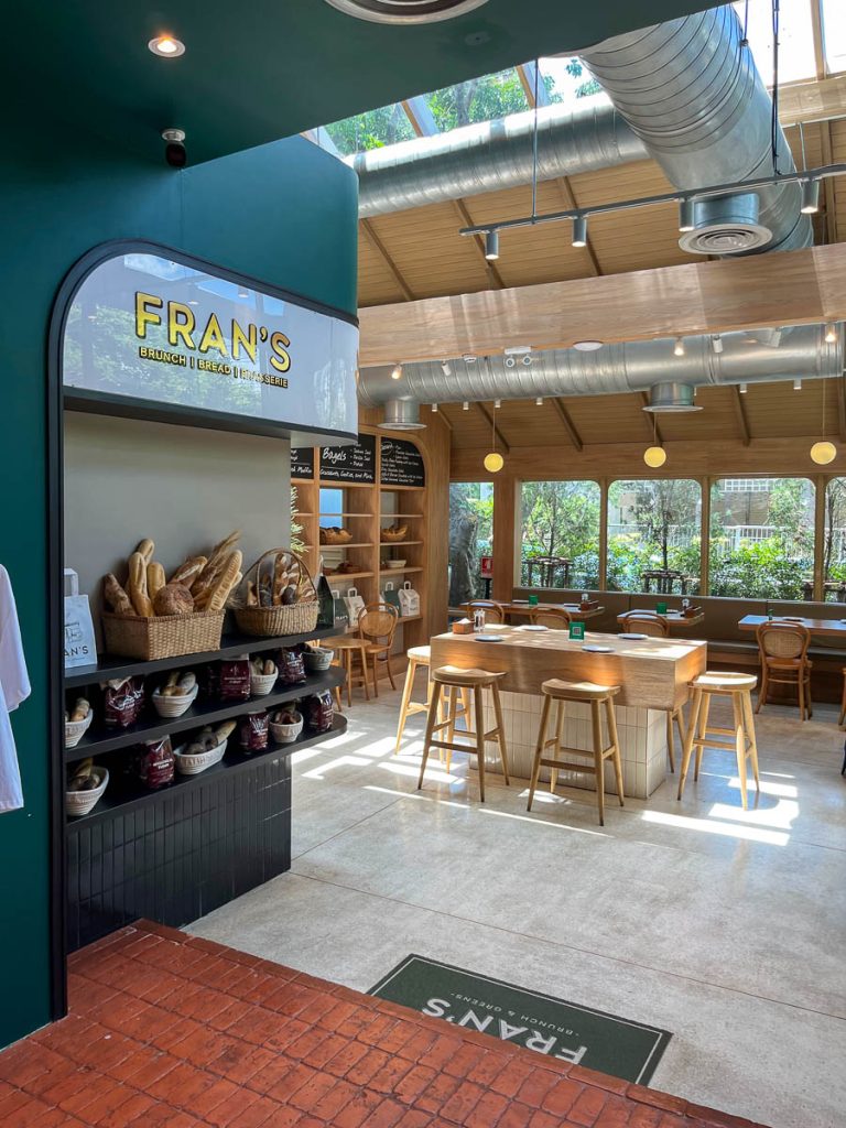 Bakery display at Fran’s Chiang Mai showing sourdough loaves and house-made bread near the entrance