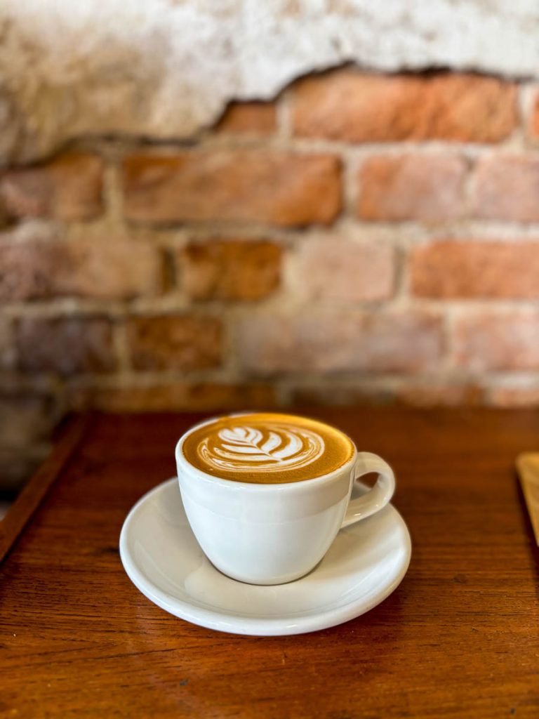 Hot latte served at Flo Coffee Brewers, a speciality coffee shop in San Pa Khoi, Chiang Mai