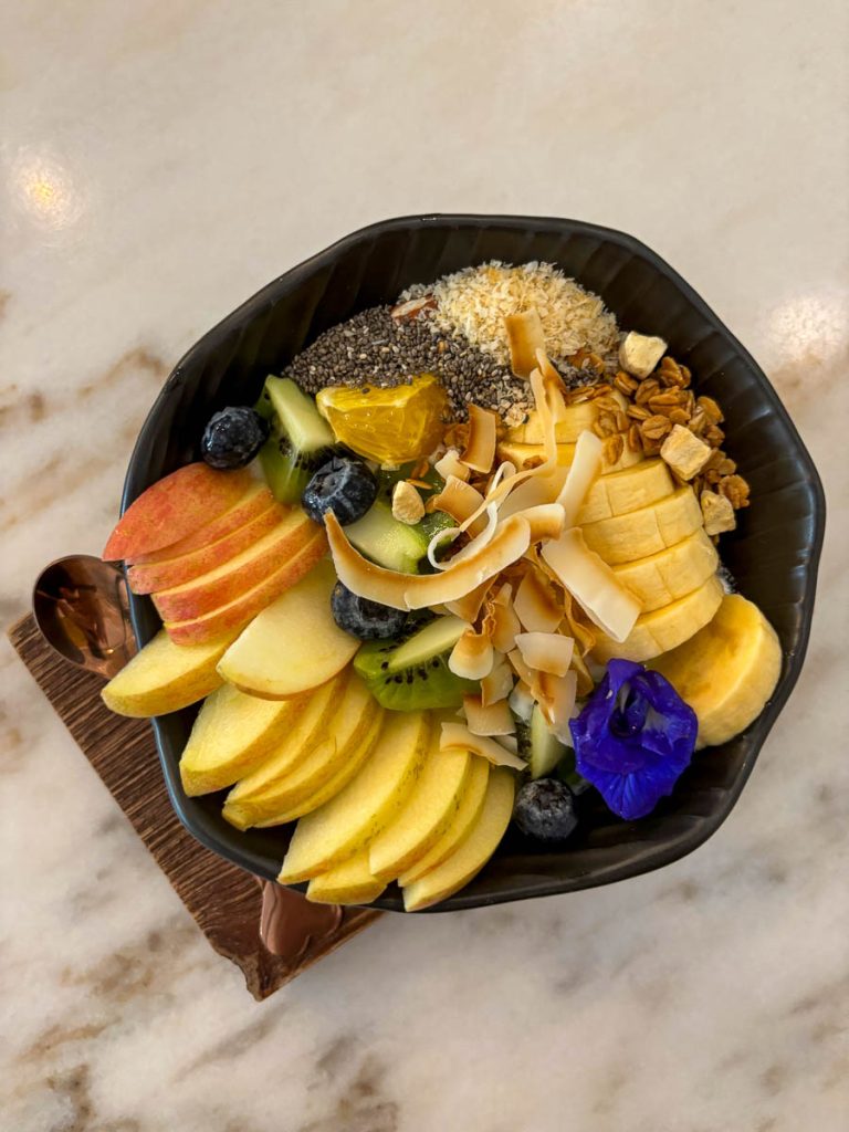 Healthy yoghurt bowl with fruit granola chia seeds and coconut at Cottontree Coffee Roasters Chiang Mai