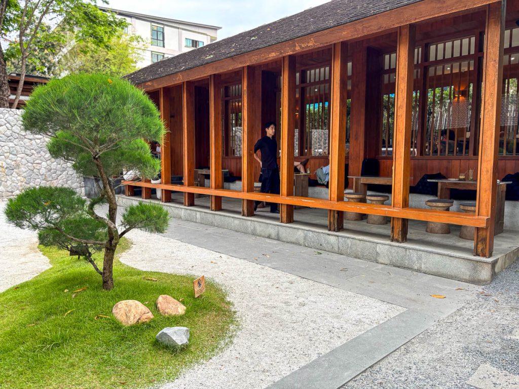 Coffee and matcha slow bar pavilion exterior beside Japanese garden Baristro Asian Style Chiang Mai