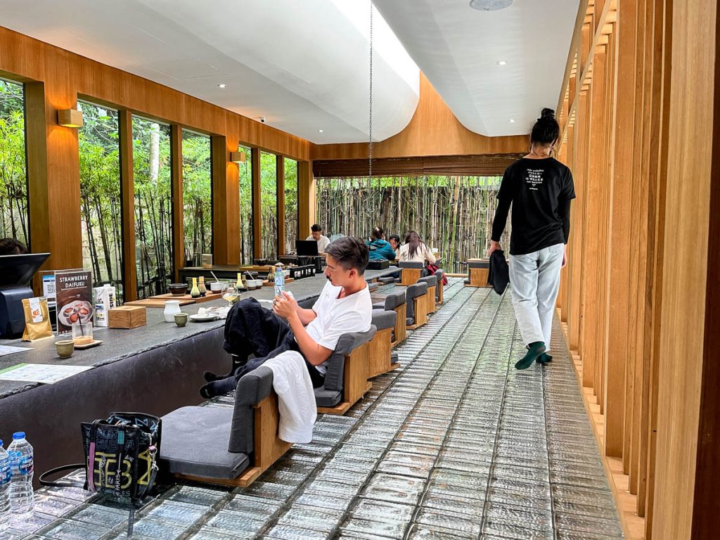 Matcha slow bar with glass block flooring and low seating at Baristro Asian Style Chiang Mai