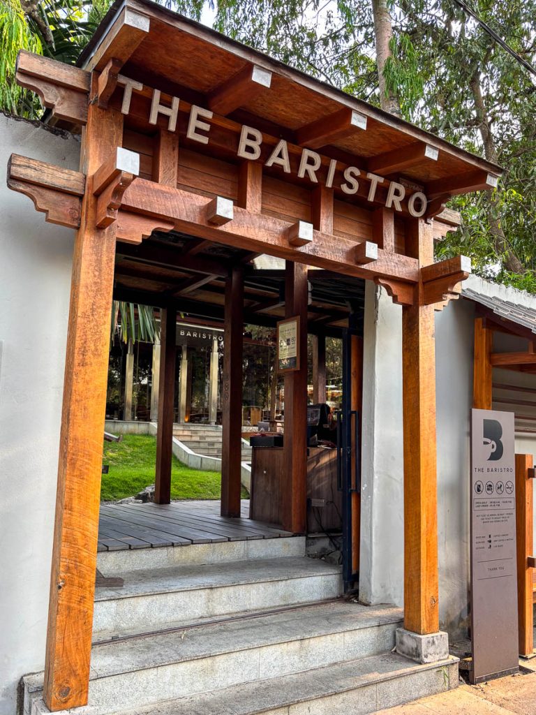 Asian-style wooden archway guiding visitors into Baristro Asian Style