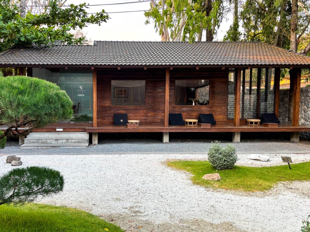 Baristro Asian Style Chiang Mai Lanna Workspace exterior with tiled roof deck seating and Japanese zen garden