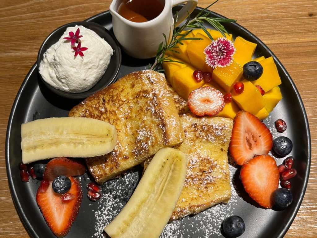 Golden Brioche French Toast with tropical fruit and coconut cream at Café de Oasis Chiang Mai