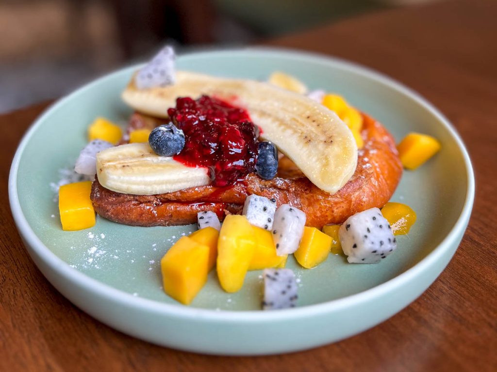 French Toast with homemade berry sauce and fruit at Goodneighbor Cafe Chiang Mai
