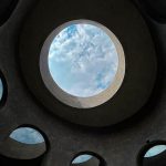 PLUTO Cafe Chiang Mai circular skylight concrete ceiling futuristic design