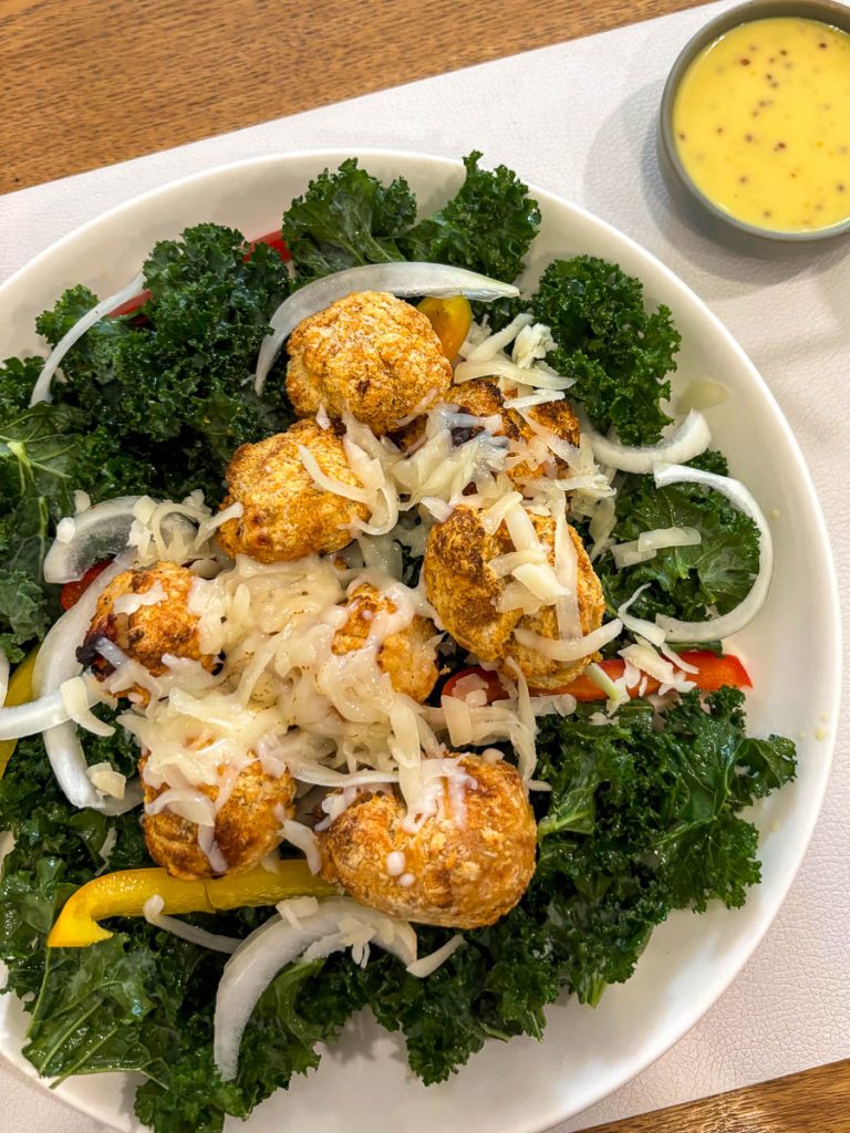 Chicken Pop Salad at Healthy Junk in Chiang Mai with air-fried chicken, kale and fresh vegetables