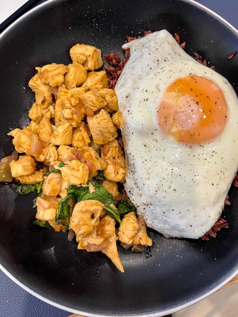 Chicken Krapow at Healthy Junk Chiang Mai with lean chicken, basil and fried duck egg