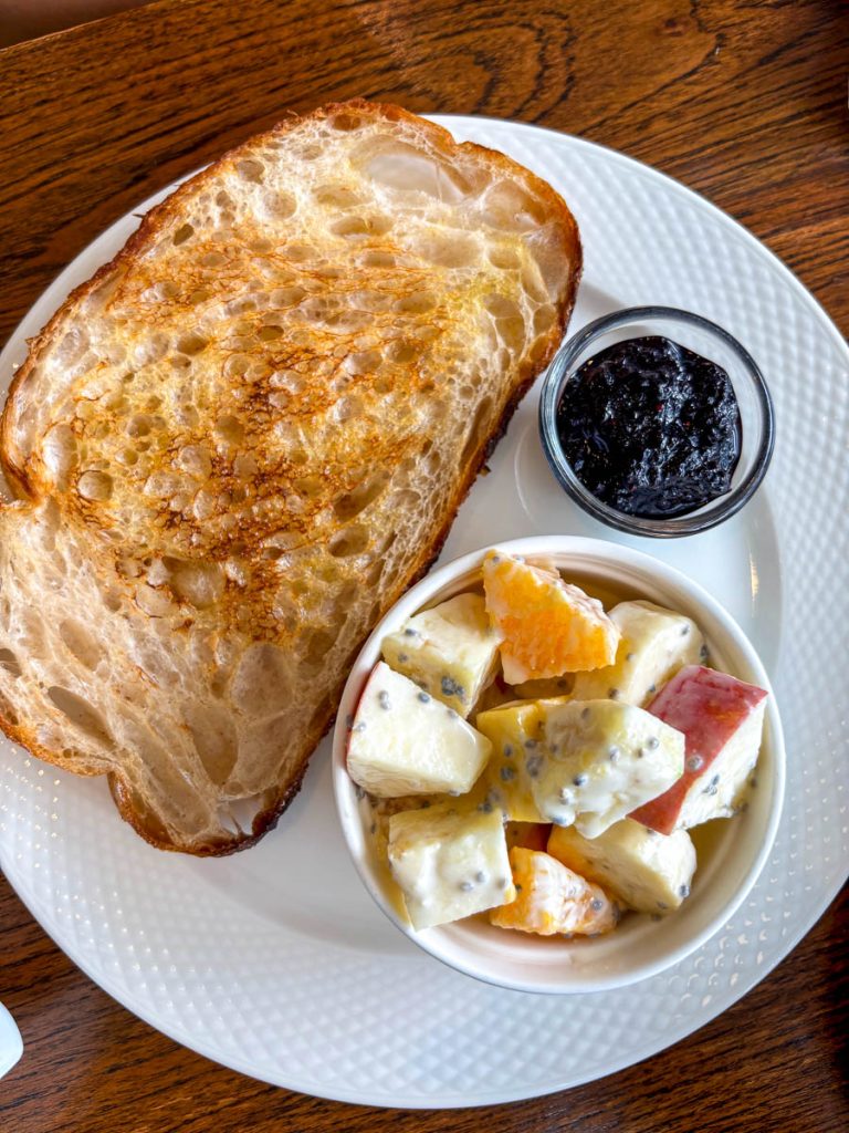 Build-your-own breakfast with sourdough, fruit salad and blueberry jam at Food4Thought East